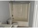 Clean bathroom with shower/tub combo and toilet at 9418 Sleepy Hollow Ln, Jonesboro, GA 30238