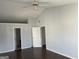 Spacious bedroom with hardwood floors and access to bathroom at 9418 Sleepy Hollow Ln, Jonesboro, GA 30238