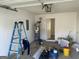 The garage is unfinished but ready for your custom touches! at 9418 Sleepy Hollow Ln, Jonesboro, GA 30238