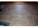 Close up view of tile floor in unfinished attic with a rug and shelf in background at 213 Meridian Dr, Stockbridge, GA 30281