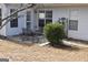 A back patio features metal outdoor furniture and garden at 213 Meridian Dr, Stockbridge, GA 30281