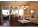 This dining room features hardwood floors and a chandelier at 213 Meridian Dr, Stockbridge, GA 30281