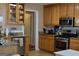 Kitchen features stainless steel appliances and granite counter tops at 213 Meridian Dr, Stockbridge, GA 30281