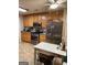 Bright kitchen featuring stainless appliances, oak cabinets, and ample counter space at 213 Meridian Dr, Stockbridge, GA 30281