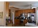 Well-lit kitchen with stainless steel appliances and granite countertops at 213 Meridian Dr, Stockbridge, GA 30281