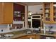 Kitchen with granite countertops, and light wood cabinets at 213 Meridian Dr, Stockbridge, GA 30281