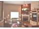 Inviting living room with a brick fireplace and ceiling fan at 213 Meridian Dr, Stockbridge, GA 30281