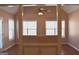 Bright, airy living room with ample windows and natural light, ceiling fan, and hardwood floors at 213 Meridian Dr, Stockbridge, GA 30281