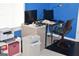Office area with work space and printer, providing a functional home office setup at 213 Meridian Dr, Stockbridge, GA 30281