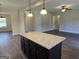 Kitchen island view of open floor plan at 5711 Laney Dr # Ln24, Rex, GA 30273