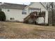 Elevated deck with stairs leading to the backyard, offering outdoor space at 228 Cornell Ct, Villa Rica, GA 30180