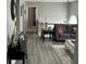 Hallway with gray flooring, leading to other rooms at 228 Cornell Ct, Villa Rica, GA 30180