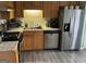 Well-equipped kitchen featuring stainless steel appliances and ample cabinetry at 228 Cornell Ct, Villa Rica, GA 30180