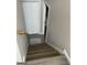 Staircase leading to the upper level of the home at 228 Cornell Ct, Villa Rica, GA 30180