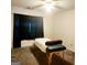 Bedroom with massage table and window coverings at 6709 Biscayne Blvd, Rex, GA 30273