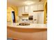 Kitchen features white cabinets and gas range at 6709 Biscayne Blvd, Rex, GA 30273