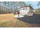 Spacious backyard with deck and fire pit at 140 Alford Dr, Fayetteville, GA 30215