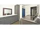 Basement bathroom with gray vanity, shower, and laundry area at 140 Alford Dr, Fayetteville, GA 30215