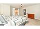 Comfortable basement bedroom with dresser and access to exterior at 140 Alford Dr, Fayetteville, GA 30215