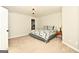 Spacious basement bedroom with a large bed and plenty of closet space at 140 Alford Dr, Fayetteville, GA 30215