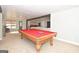 Pool table in a spacious finished basement recreation area at 140 Alford Dr, Fayetteville, GA 30215