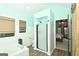 Elegant bathroom with a soaking tub, walk-in shower, and barn door at 140 Alford Dr, Fayetteville, GA 30215