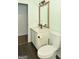 Updated bathroom with a stylish vanity and a large mirror above at 140 Alford Dr, Fayetteville, GA 30215