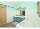 Bathroom boasts double sinks, a large mirror, and a soaking tub at 140 Alford Dr, Fayetteville, GA 30215