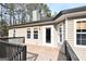 Deck overlooking backyard with wooded views at 140 Alford Dr, Fayetteville, GA 30215