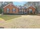 Brick ranch house with a large yard at 140 Alford Dr, Fayetteville, GA 30215