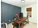 Bright home office with a statement geometric wall and built-in desk at 140 Alford Dr, Fayetteville, GA 30215