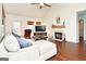 Relaxing living room with hardwood floors, fireplace, sectional sofa and backyard access at 140 Alford Dr, Fayetteville, GA 30215
