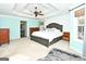 Spacious main bedroom with tray ceiling, large windows, and ensuite bathroom at 140 Alford Dr, Fayetteville, GA 30215