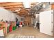 Unfinished basement area with exposed utilities and storage at 140 Alford Dr, Fayetteville, GA 30215