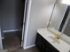 Bathroom with vanity, sink, and shower at 1340 Napa Valley Dr, Lawrenceville, GA 30045