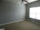 Spacious bedroom with neutral walls and carpet at 1340 Napa Valley Dr, Lawrenceville, GA 30045
