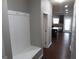 Bright foyer with a built-in bench and coat hooks at 1340 Napa Valley Dr, Lawrenceville, GA 30045