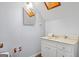 Clean bathroom with white vanity and toilet at 6051 Reynolds Rd, Morrow, GA 30260