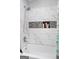 Updated bathroom with marble tile shower/tub combo at 6051 Reynolds Rd, Morrow, GA 30260