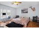 Bright bedroom with hardwood floors and a workspace at 6051 Reynolds Rd, Morrow, GA 30260