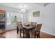 Dining area with bay window and wood floors at 6051 Reynolds Rd, Morrow, GA 30260