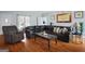 Living room features hardwood floors and a comfortable layout at 6051 Reynolds Rd, Morrow, GA 30260