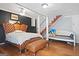 Large main bedroom with ensuite and daybed at 6051 Reynolds Rd, Morrow, GA 30260