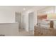 Hallway with natural light, neutral walls, and modern decor at 205 Friendship Oak Way, Hampton, GA 30228