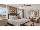 Serene main bedroom with elegant decor, soft lighting, and large windows at 205 Friendship Oak Way, Hampton, GA 30228