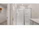 Bright shower featuring glass doors and built in shelving at 205 Friendship Oak Way, Hampton, GA 30228