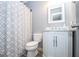 Clean bathroom with white vanity, shower, and updated fixtures at 165 Nandover Way, Fayetteville, GA 30215