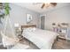 Cozy bedroom featuring a comfortable bed, hanging chair, and décor at 165 Nandover Way, Fayetteville, GA 30215