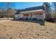 Ranch style home with front porch and large yard at 165 Nandover Way, Fayetteville, GA 30215