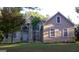 Two-story house with stucco siding, landscaping, and a large front yard at 190 Oakwood Lakes Dr, Hampton, GA 30228